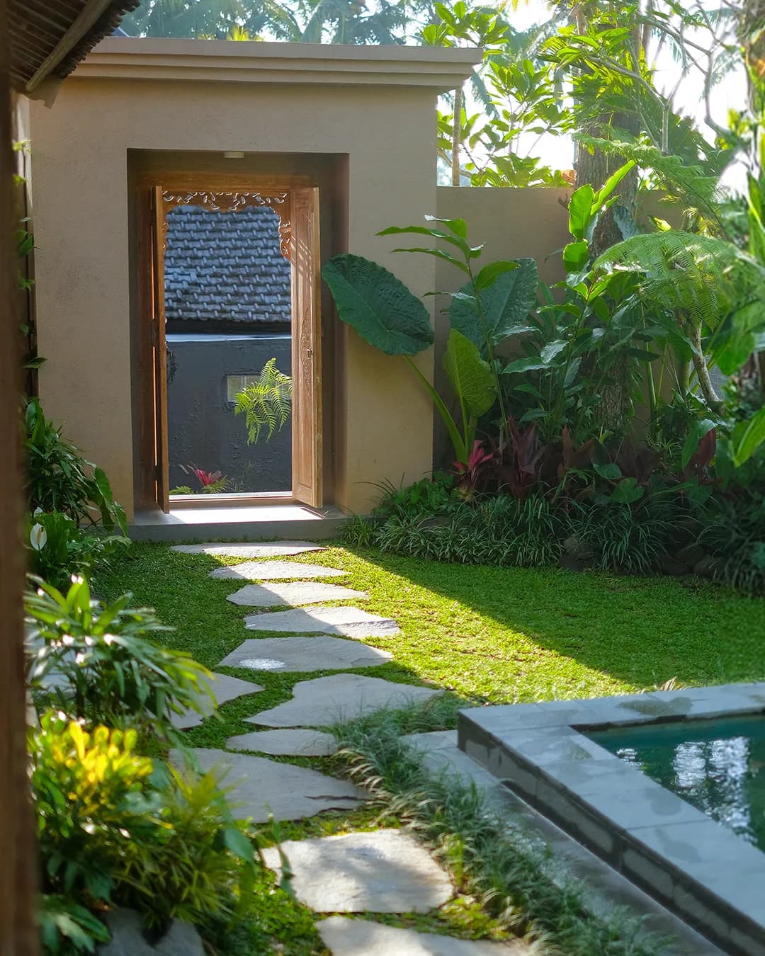 Outdoor garden view from kitchen area of private villa in Bali